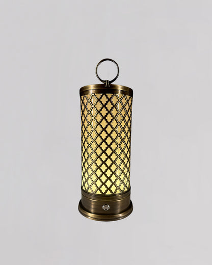 Decorative lantern with lattice design and glowing interior on a gray background