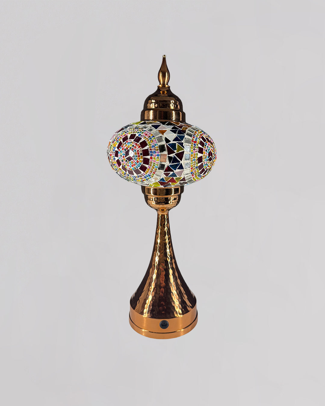 Decorative lamp with mosaic design on a gray background