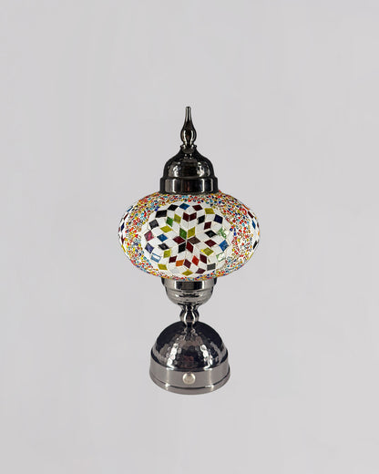 Decorative lamp with a colorful geometric design on a white background
