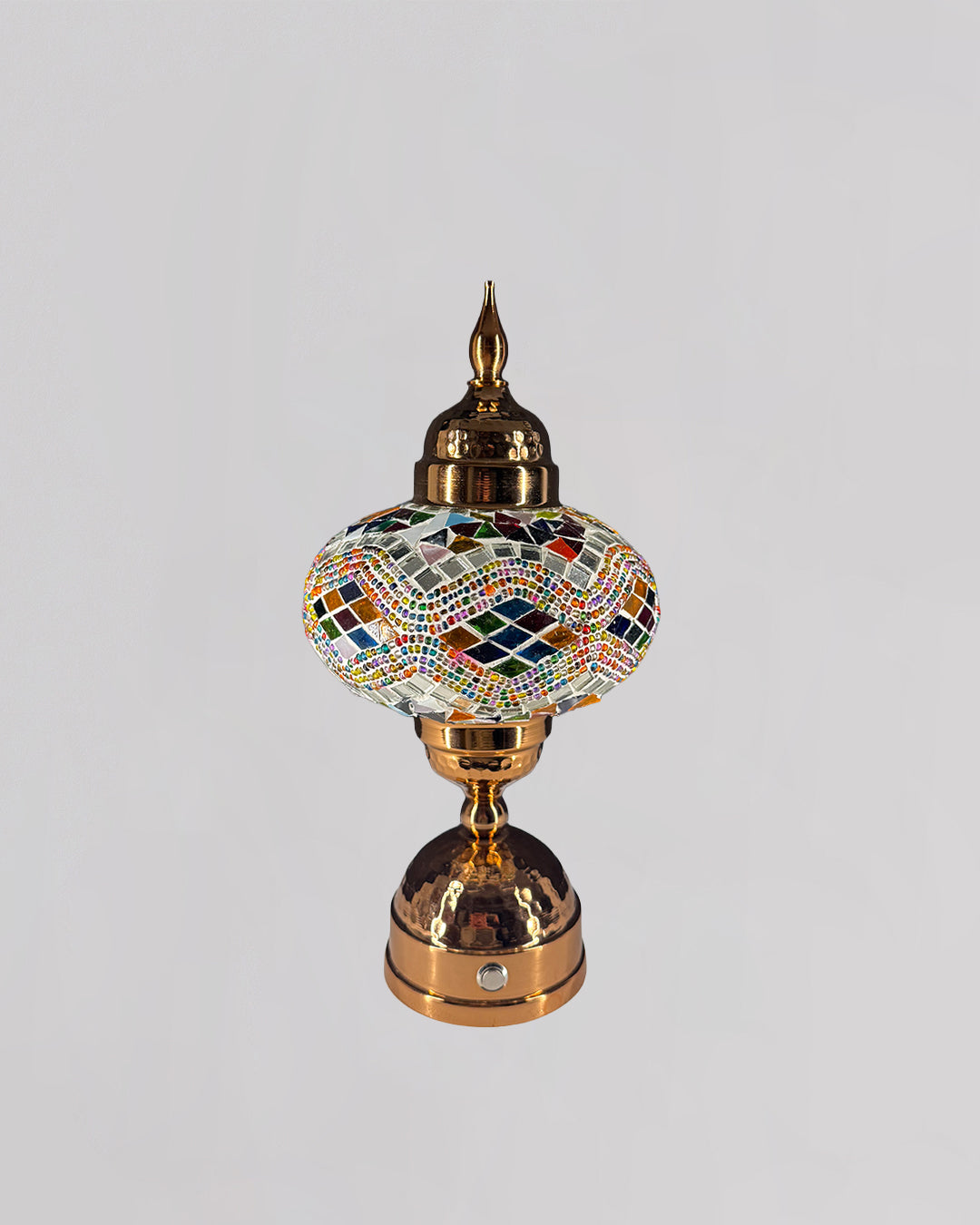Decorative lamp with mosaic design on a gray background
