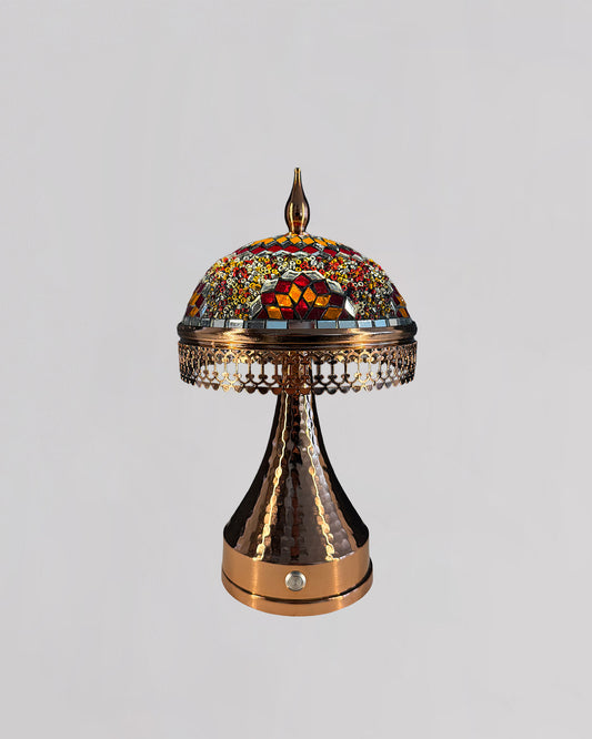 Decorative lamp with mosaic top on a gray background