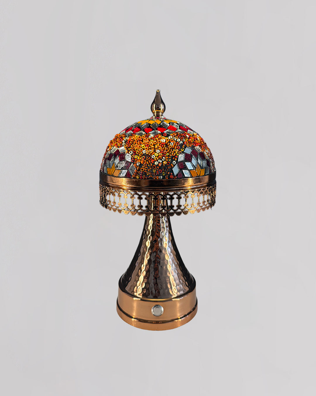 Decorative lamp with intricate design on a light gray background