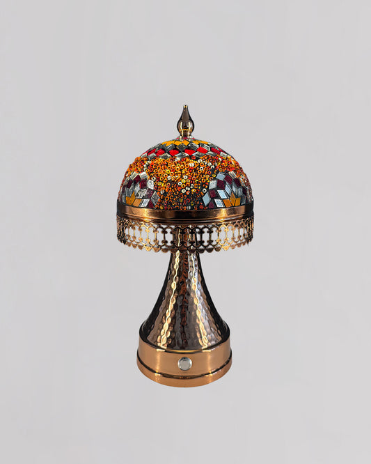 Decorative lamp with intricate design on a light gray background