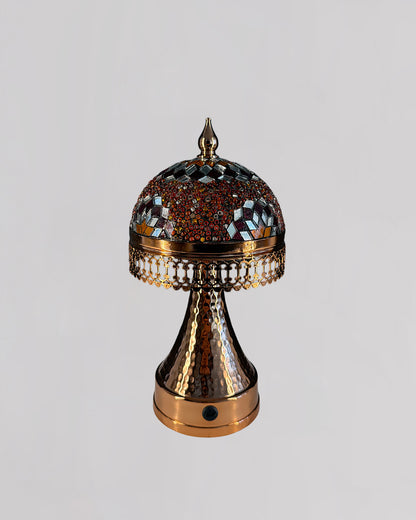 Decorative lamp with intricate design on a gray background