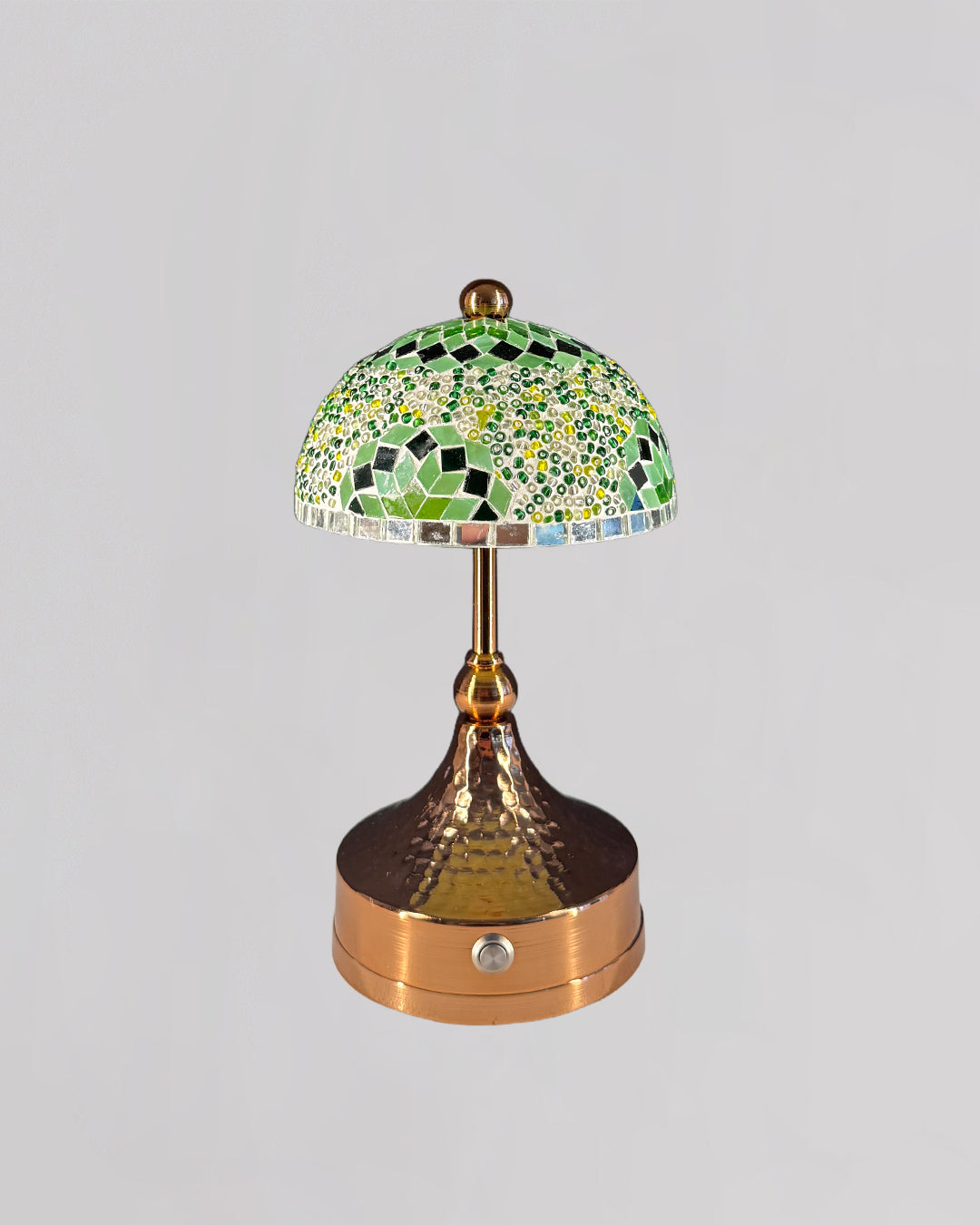 Decorative table lamp with mosaic-style shade on a gray background