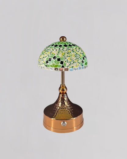 Decorative table lamp with mosaic-style shade on a gray background