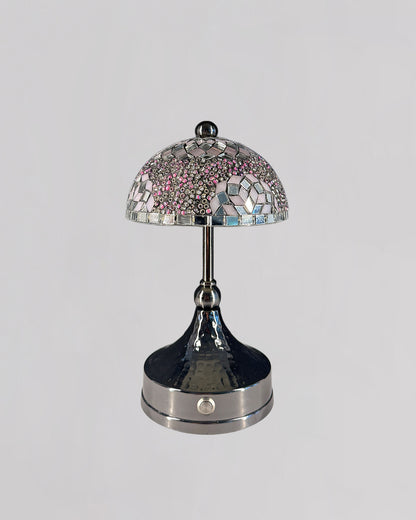 Decorative table lamp with mosaic design on a gray background