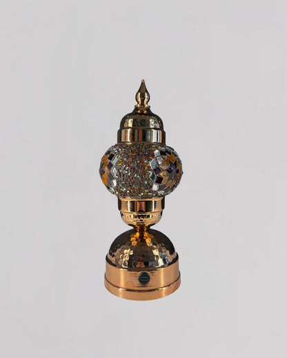 Decorative lamp with crystal ball on a gray background