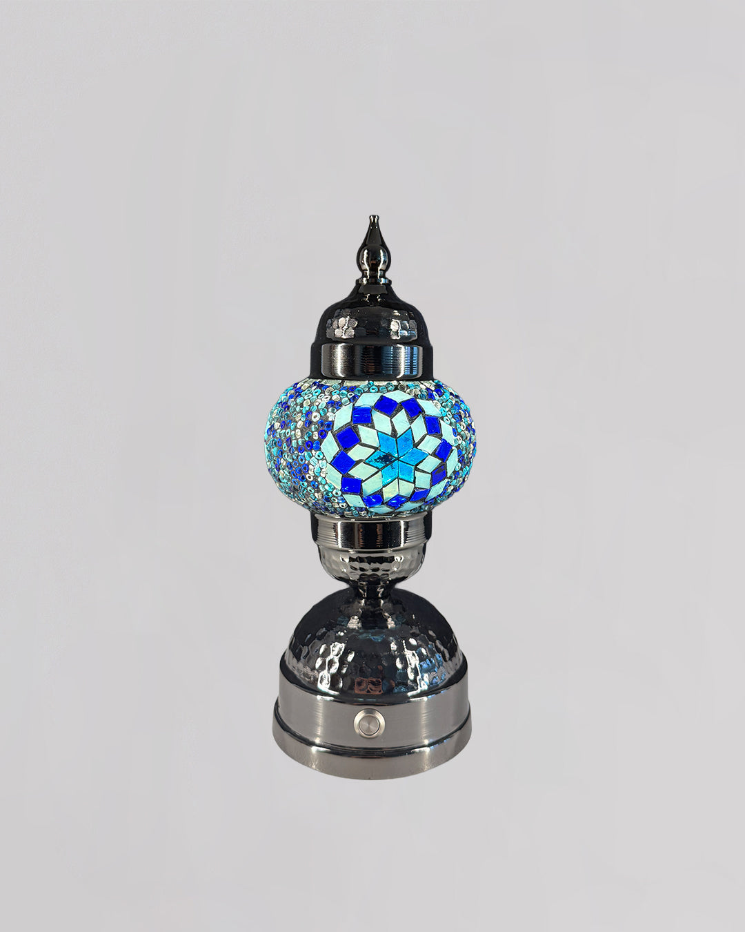 Decorative lamp with a blue and silver design on a gray background